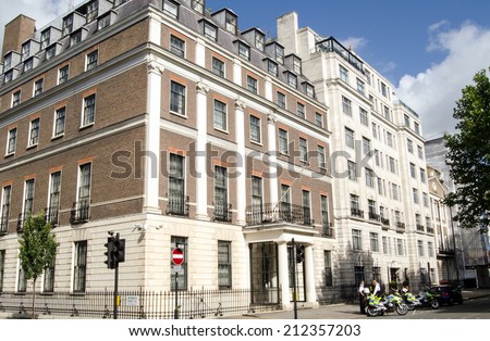 LONDON, UK - JUNE 28, 2014: Diplomatic Protection Officers outside the Embassy of the Peoples\' Republic of China in London.