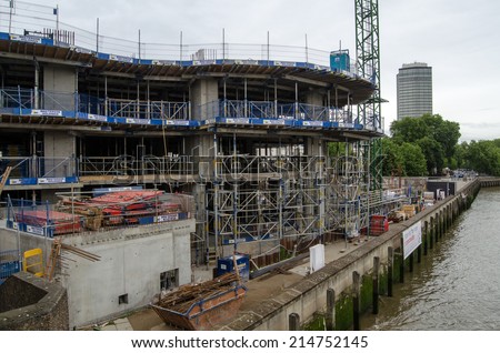LONDON, UK - JULY 6, 2014:  Construction of the new River Walk Gardens apartment complex on the banks of the River Thames in Pimlico, London.