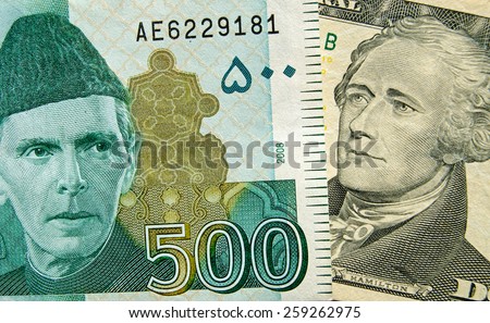 Banknotes with founding fathers.  The Pakistan 500 rupee with Jinnah and 10 dollar bill with Hamilton, one of the US founding fathers.  \
Used banknotes, shown at an angle with less than 80% displayed.