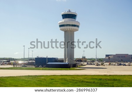 GATWICK AIRPORT, UK - MAY 16, 2015:  The main control tower at London\'s Gatwick Airport in West Sussex.