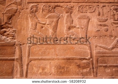 Grain carving, Luxor Temple An ancient egyptian hieroglyphic carving of hoppers of grain being offered to the gods.