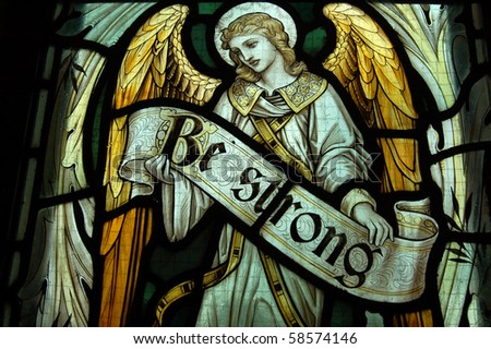 Be Strong, horizontal An angel holding the banner reading Be Strong. Fragment of a memorial stained glass window created in 1911 to commemorate a soldier killed during World War One.
