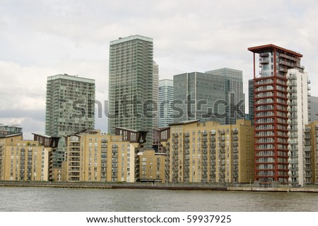 Isle of Dogs, viewed from the River Thames Modern office and apartment blocks in the Canary Wharf district of the Isle of Dogs, part of London\'s Docklands.  London.