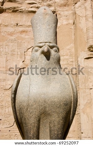 Ancient Egyptian granite statue of the hawk god Horus.  Temple of Horus, Edfu, Egypt.