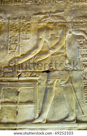Ancient egyptian stone carving of the ram headed god Khnum.  Interior of the Temple of Horus, Edfu, Egypt.