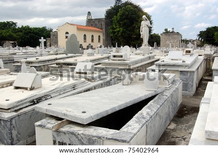 A family tomb opened and awaiting its next body.  Havana, Cuba.