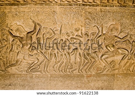 Bas relief carving showing one of the 32 hells in the Hindu religion.  South gallery, Eastern section at Angkor Wat Temple, Siem Reap, Cambodia.