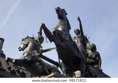 Statue of Boudica in her chariot.  The Queen of the Iceni tribe during the Roman Empire.  Also spelt Boudicca and Boadicea.  Statue erected on north bank of Westminster Bridge 1902.