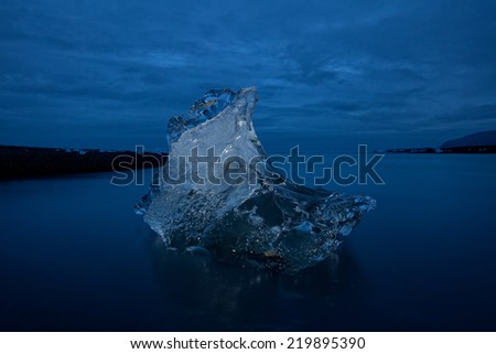 Iceberg from the famous Jokulsarlon glacier lake in Iceland (Island) - icebergs originate from the Vatnajokull float. Location was used for various action movies (like most of Iceland).