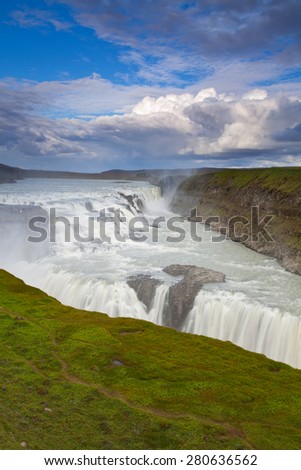 Gullfoss waterfall - beautiful wild landscape of big waterfalls, green mountains, glaciers and volcanoes