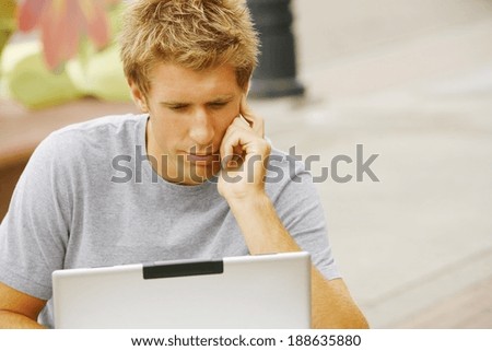 Man Behind A Laptop