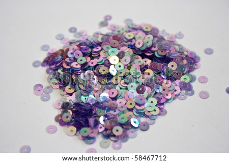 http://image.shutterstock.com/display_pic_with_logo/622174/622174,1280987812,1/stock-photo-rainbow-sequins-58467712.jpg