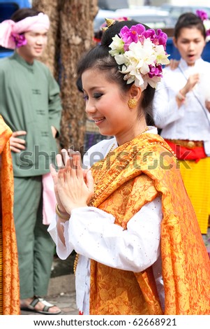 BANGKOK, THAILAND - OCTOBER 3: Thai traditional dance. This is the parade of making traditional merit of people from the northern territory of Thailand, October 3, 2010 in Bangkok, Thailand.