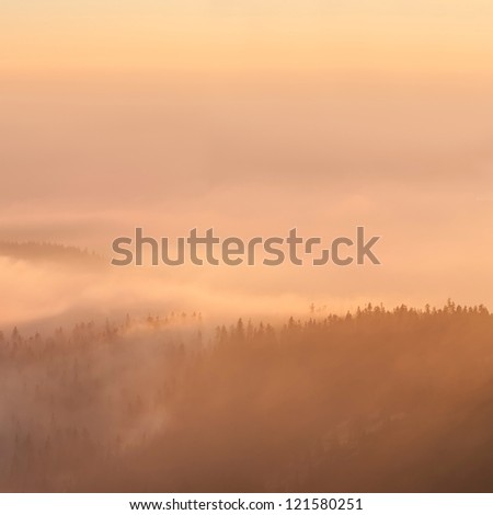 Beautiful misty sunset, panoramic picture, square format.