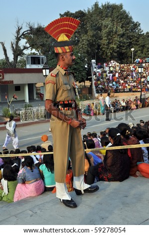 WAGAH BORDER, INDIA - 25 OCTOBER: Member of indian Border security force guards during the ceremonial on indo-pakistan border on October 25, 2009 in Wagah border. The ceremonial is held every day.