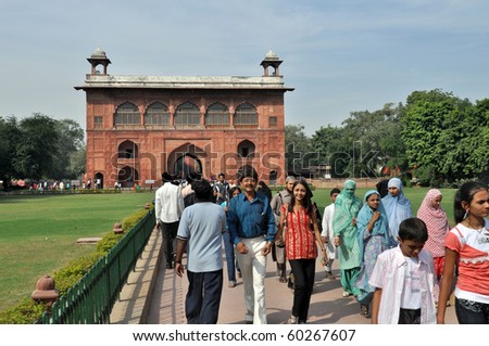 OLD DELHI, INDIA -OCTOBER 24: People enter the Red Fort on October 24, 2009 in Old Delhi, India. The Red Fort, a UNESCO World Heritage, is one of the most popular tourist destinations in Old Delhi.