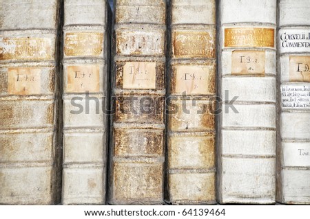 Detail of line of ancient books, picture taken in the Central Europe.