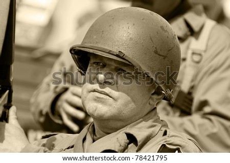 American veteran in helmet, vintage style (sephia color).