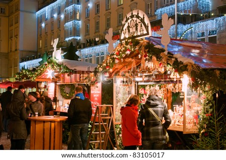 DRESDEN, GERMANY - DECEMBER 20: People enjoy Christmas market in Dresden on December 20, 2010 in Dresden, Germany. It is Germany\'s oldest Christmas Market with a very long history dating back to 1434.