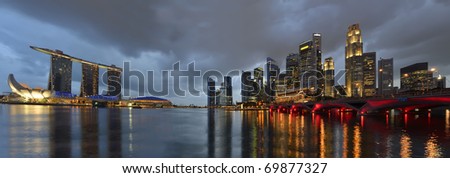 Panorama of Singapore river and skyline at blue hour