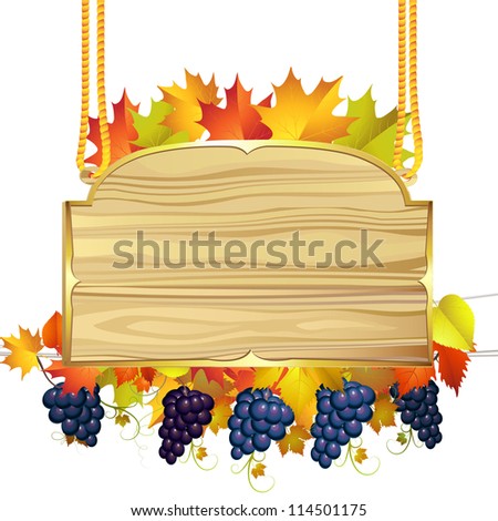 Wood banner with autumn colorful leaves and grapes