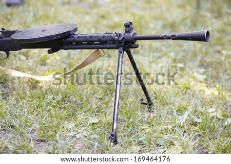 Black heavy machine gun in the field