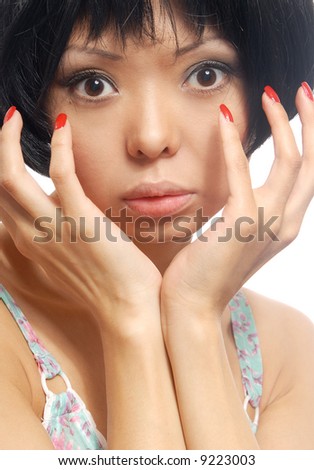Close-up portrait of the pretty woman with nails