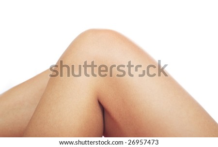 Close-up photo of the human knee on a white background