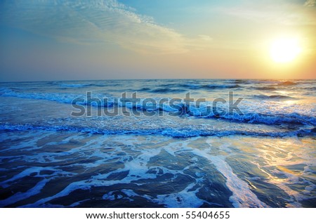 Ocean with waves during sunset. Natural darkness and colors
