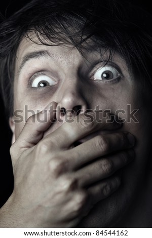 stock-photo-afraid-male-victim-human-with-hand-covering-his-mouth-84544162.jpg
