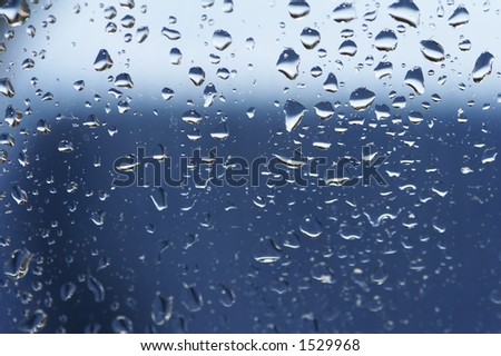 raindrops at a window - blue background