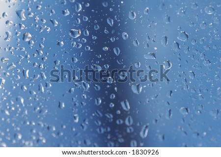 raindrops at a window - blue background