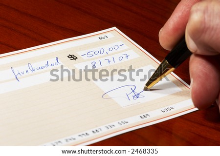 signing a bank check