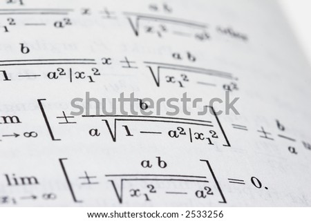 open mathematics book on black background