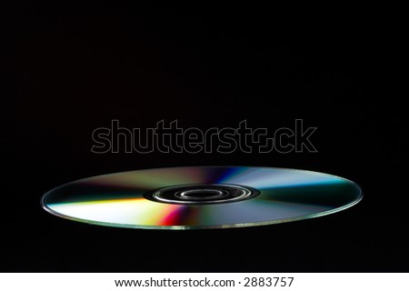 DVD Disc on black background - landscape format