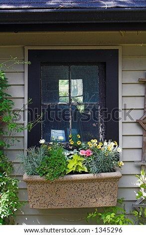 barn garage window and flower box