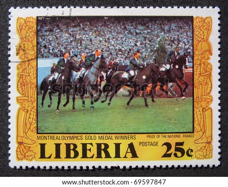 LIBERIA - CIRCA 1970: A stamp printed in CUBA shows Olympic gold medal horse riding, circa 1970.