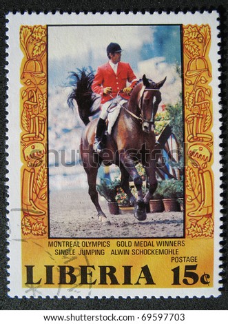LIBERIA - CIRCA 1970: A stamp printed in CUBA shows Olympic gold medal horse riding, circa 1970.