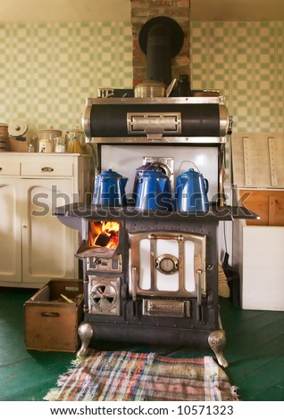 Antique Cast Iron Wood-Burning Kitchen Stove Stock Photo 10571323 ...