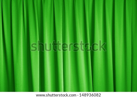 curtain of cinema stage background, green dramatic tone