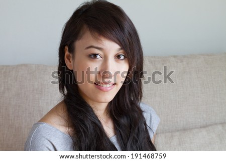 happy and positive woman in casual dress, indoor scene