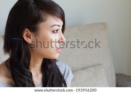 bored woman with negative facial expression