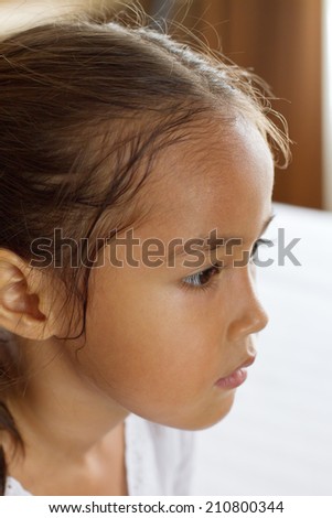 portrait of little girl indoor scene