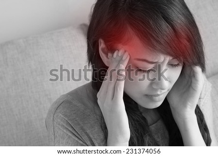 woman with headache, migraine, stress, insomnia, hangover, asian caucasian indoor scene