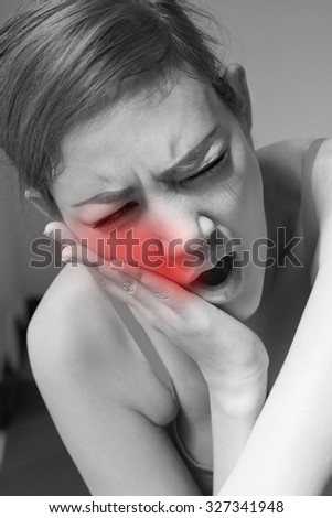 woman suffering from jaw pain, toothache, tooth sensitivity