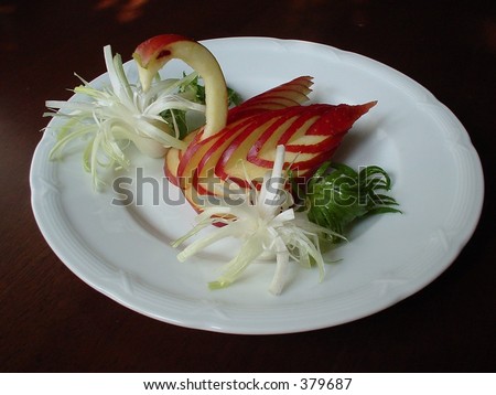 8 قواعد ثابتة لتزيين أطباقك Stock-photo-food-decoration-carved-vegetables-and-fruits-379687