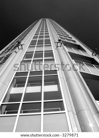 high modern building with converging lines, looking up, black and white