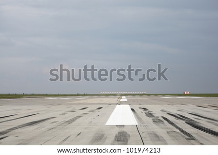 Skid marks on at the airport runway - selective focus