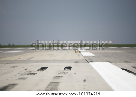 Skid marks on at the airport runway - selective focus