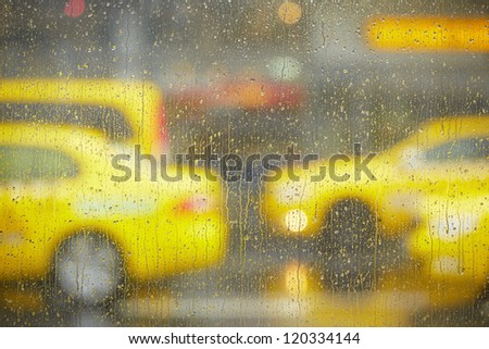 Taxi cars in rain - selective focus